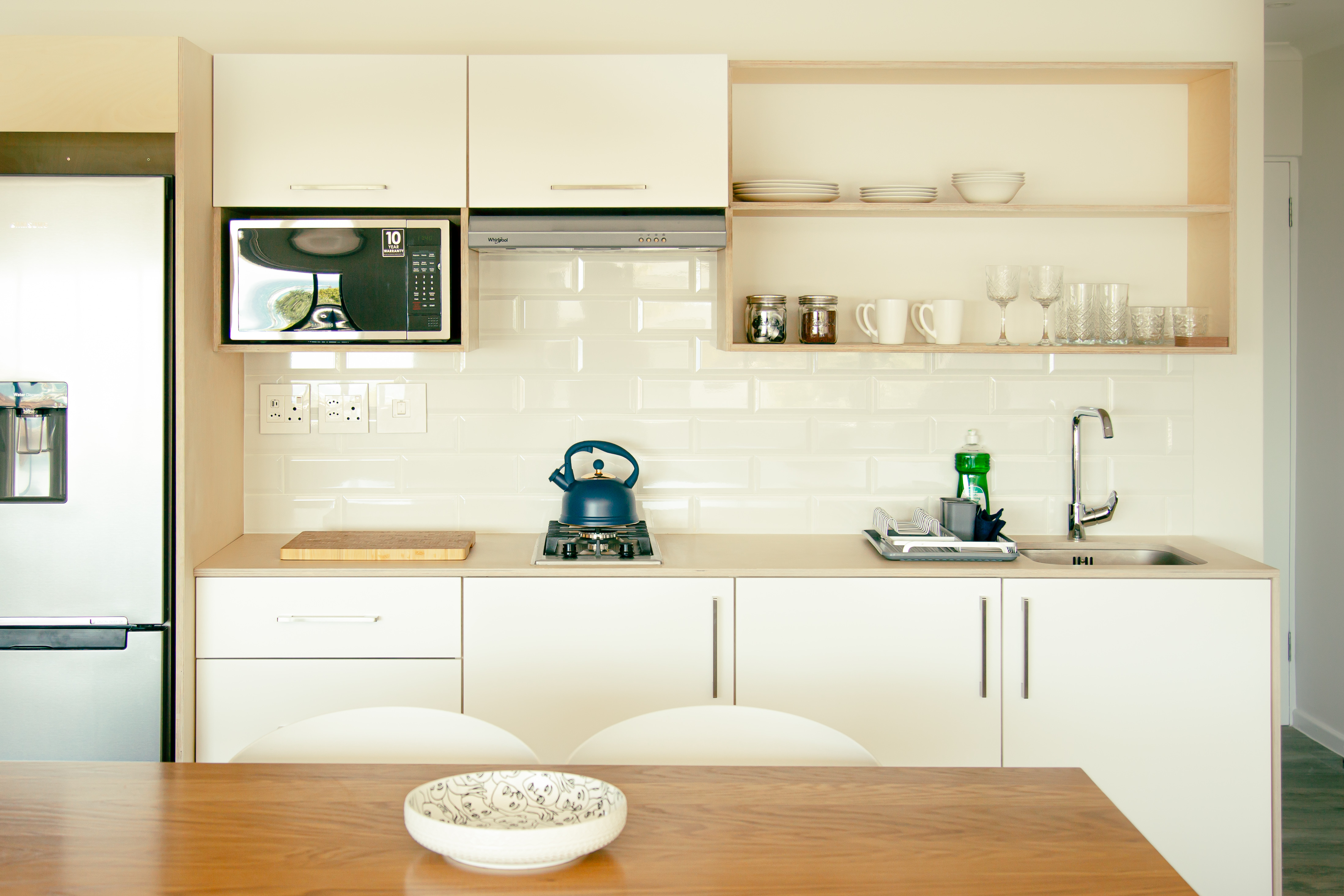 Detail of the kitchen joinery showing the birch ply edge profile.